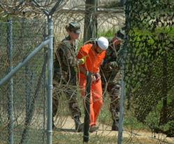 In Guantanamo Cuba: Torture to one, interrogation to another